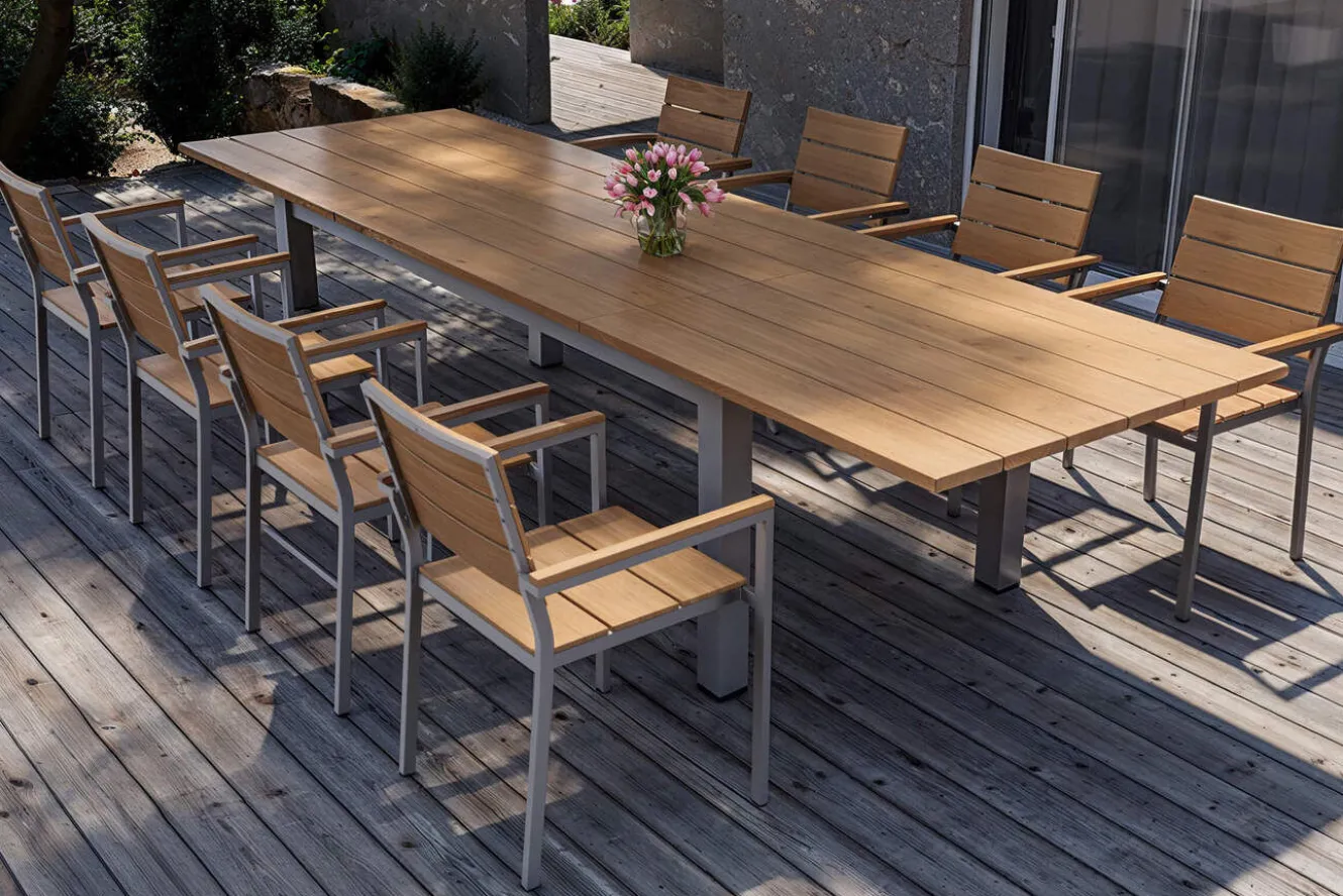 OUTFLEXX Falun Garten-Essgruppe mit 8 Sesseln, braun/silber, Teakholz/Edelstahl, 220/340 x 100 cm, ausziehbar stapelbar FSC®-zertifiziert
