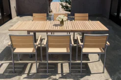 OUTFLEXX Falun Garten-Essgruppe, braun, Teakholz/Edelstahl, Ausziehtisch 180/240 x 100 cm, inkl. 6 Stapelsessel, FSC®-zertifiziertes Produkt