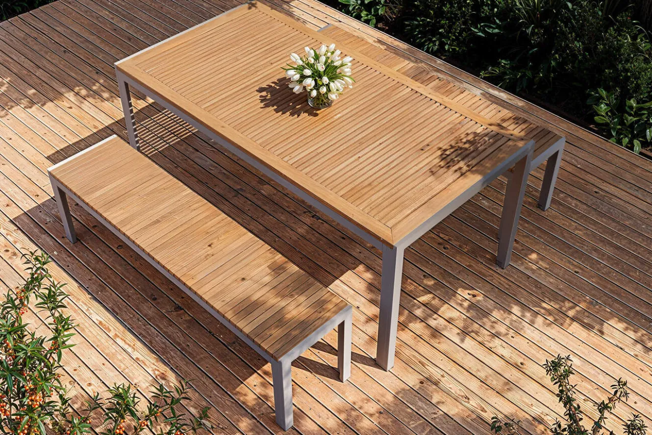OUTFLEXX Falun Garten-Essgruppe, braun/silber, Edelstahl/Teakholz, 180 x 90 cm Tisch und 2 Bänke 160 x 38 cm