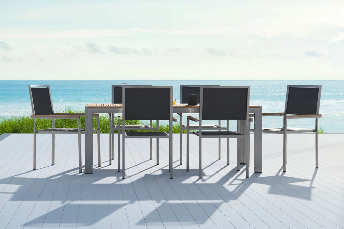OUTFLEXX Garten-Essgruppe, schwarz, Edelstahl/Teak, Esstisch 180 x 90 cm, 6 Stapelstühle gepolstert