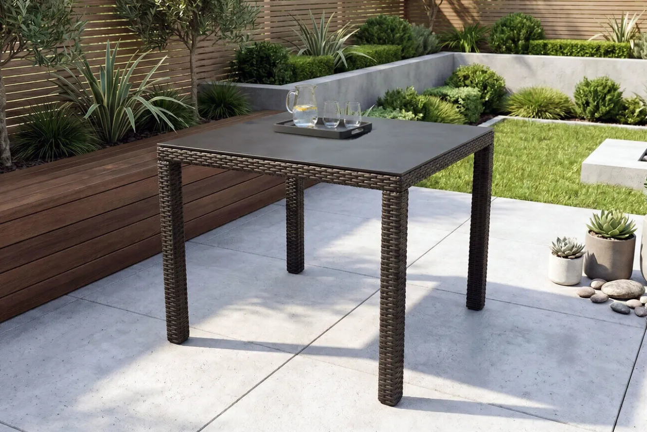 OUTFLEXX Rocking Dining Tisch, grau/braun-meliert, Polyrattan, 90 x 90 cm, Glasplatte in Steinoptik