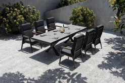 OUTFLEXX Serro Garten-Essgruppe, schwarz/anthrazit, Alu/Steinimitat/Teak, Tisch 200/260 x 100 cm, ausziehbar, 6 Stapelsessel