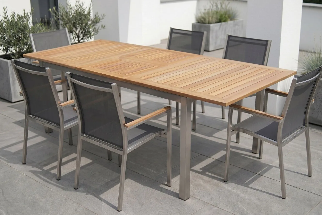 STERN Cardiff Garten-Essgruppe, silber/silbergrau, Edelstahl/Teak, Tisch 180/240 x 100 cm, 6 Stapelsessel, FSC®-zertifiziertes Produkt